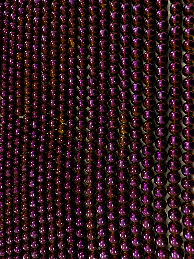 Cuentas de Hematita Púrpura dorada A de 6mm en hilo de 40cm.