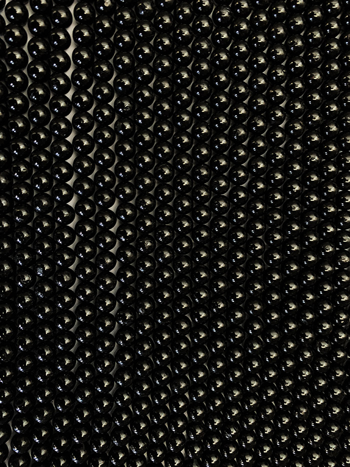 Perlas de turmalina negra A de 8mm en hilo de 40cm