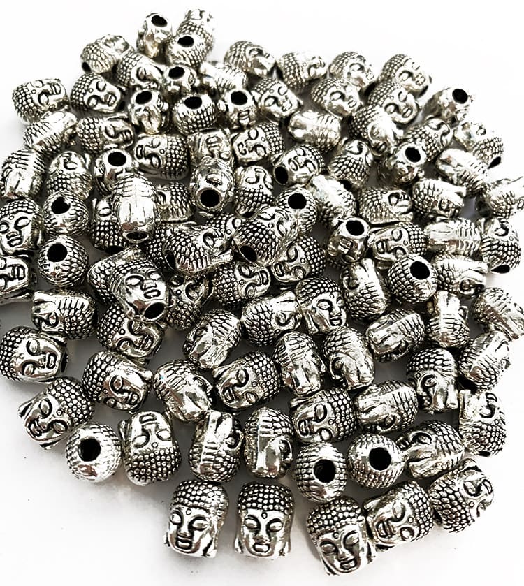 Perlas charm’s ronda cabeza de buda plateada 6mm x100