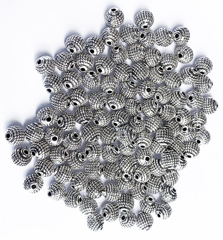 Espaciador de metal plateado redondo tribal 8mm x100