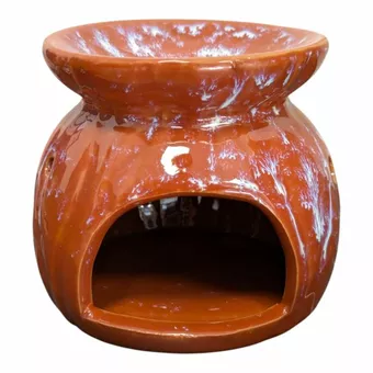 Quemador de aceite de cerámica roja con tonos claros