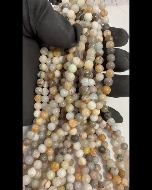Perlas de Agate Plume de 6mm en hilo de 40cm