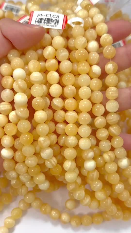 Perlas de Calcita Naranja de 8mm en hilo de 40cm