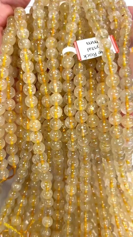 Cuentas de cristal de roca Rutilo A+ 7 mm en hilo de 40 cm