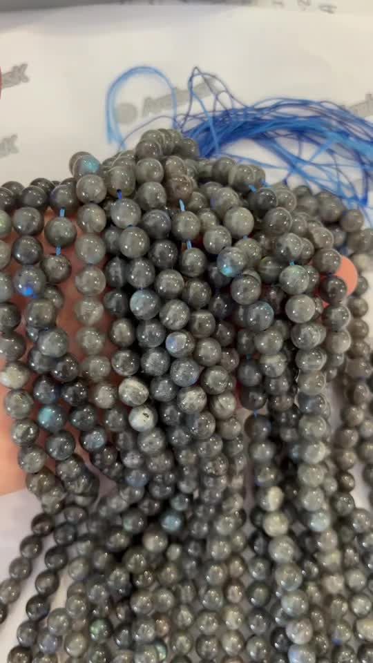 Perlas de labradorita Oscura AA de 8mm en hilo de 40cm.