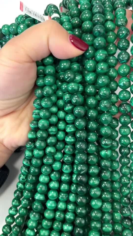 Perlas de malaquita A de 8mm en hilo de 40cm