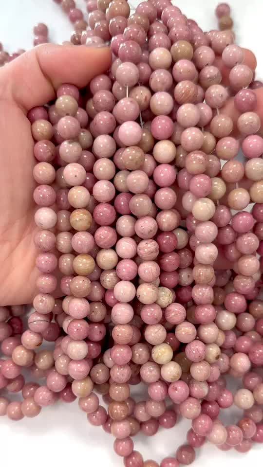 Perlas de Australiana Rhodonite A de 8mm en hilo de 40cm